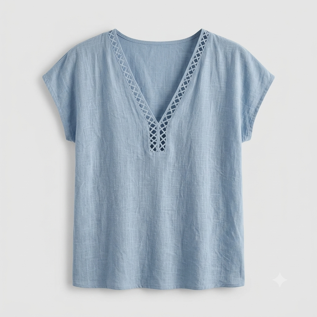 A light blue short-sleeve linen top with a V-neckline featuring a decorative cutout lace detail, shown against a light gray background.